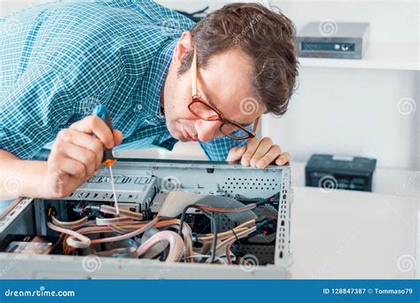 Expert Man Assembling Pc And Checking For Problem Stock Image Image