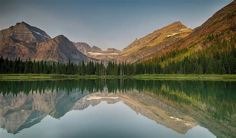 Reflection On Lake Josephine In Glacier National Park Photograph By