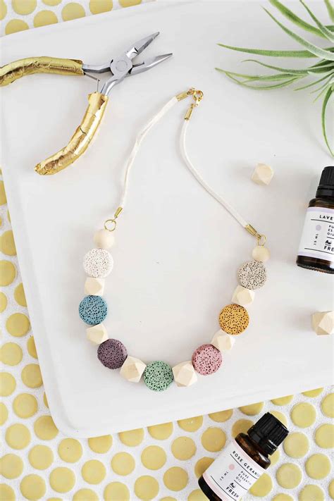 Lauren is going to be showing us how to make these super cute flower pendant necklaces to give to your bridesmaids. DIY Epoxy Resin Jewelry - A Beautiful Mess