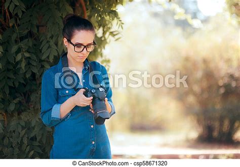 Female Photographer With Dslr Camera In The Park Canstock