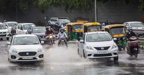 Delhi Ncr Rain Heavy Downpour Leads To Flooding Traffic Jams And