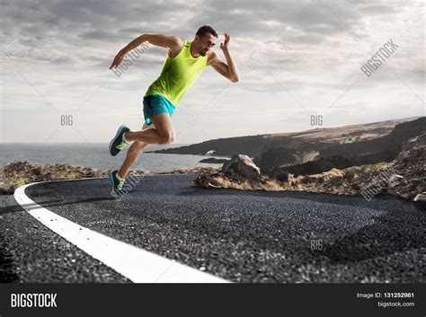 Running Athlete Man Male Runner Sprinting During Outdoors Training For