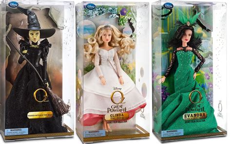 The 2015 17'' limited edition jasmine dolls by the disney store, standing side by side: A Doll's Life: Oz the Great & Powerful Disney Store Dolls