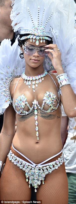rihanna sips hip flask and dances in bejewelled bikini at barbados carnival daily mail online