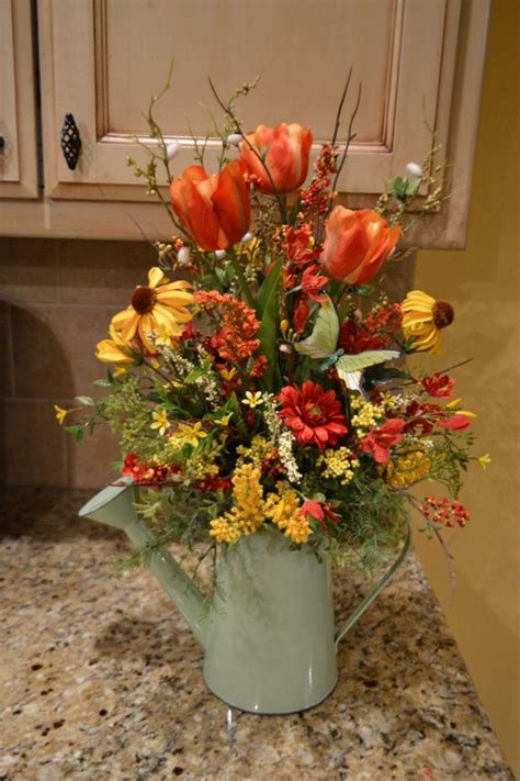 Spring Butterfly Arrangement In Watering Can Spring Floral