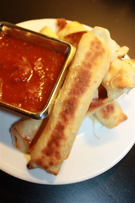 Start with the less is more strategy. Olive The Ingredients: Baked or Fried Mozzarella Sticks