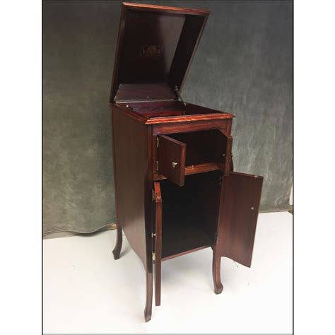 This record player storage cabinet is made completely out of plywood. Antique Victrola Wood Record Player Cabinet | Chairish