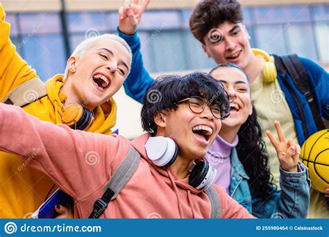 Group Of Multiethnic Young Friends Having Fun And Smiling Four Diverse