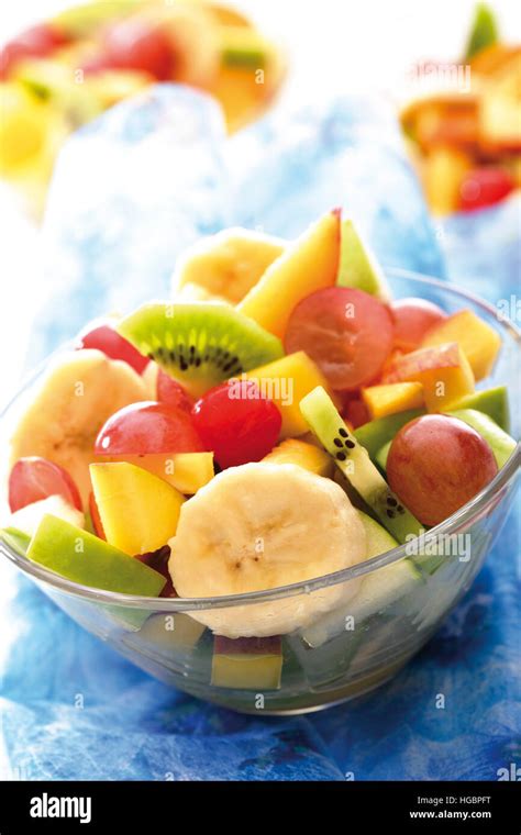 Fruit Salad Kiwis Grapes Bananas Apples Mango And Peaches Stock