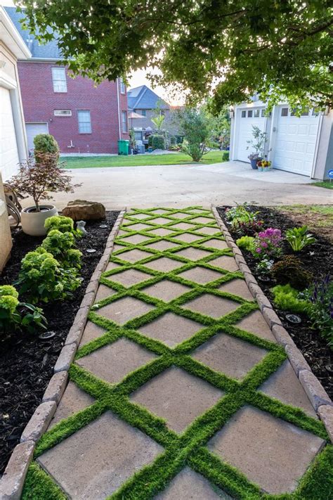 How To Lay A Paver Walkway With Grass In Between Paver Walkway Diy Backyard Walkway Garden