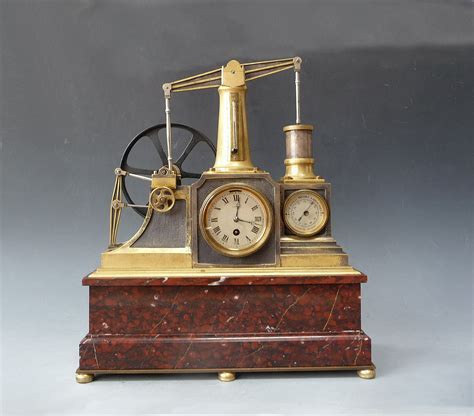 A Guilmet Industrial Clock A Flywheel Pump Timepiece With Barometer