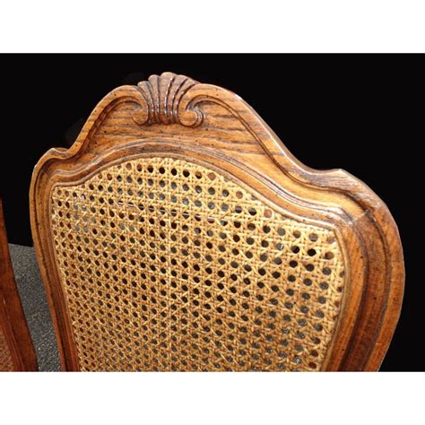 A mix of dining chairs surround the. Set of Six French Country Oak Cane Dining Room Chairs by ...