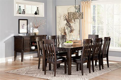 There is something about a big dining room table that just exudes class and refinement, even if they are made to appear more rustic. Haddigan 5-Piece Dining Room Set with Extendable Table, 4 ...
