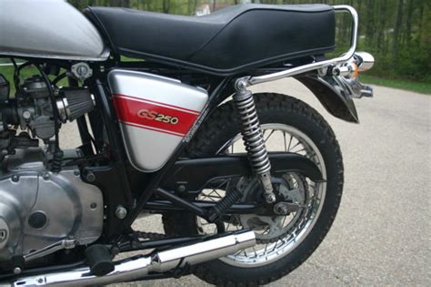 The 2020 gsx250r is a fully faired street machine that brings the excitement and riding satisfaction of suzuki's sportbike heritage to a broader a. Suzuki GS250 Custom Scrambler