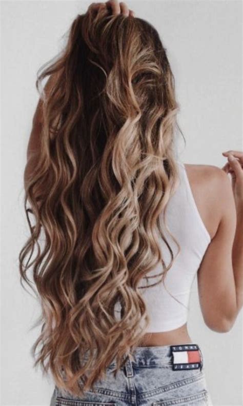 If you've already planned to put your hair up into a bun a similar style, then you can skip most advice and try this simple technique. long curly hair styles for girls | for prom | wavy ...