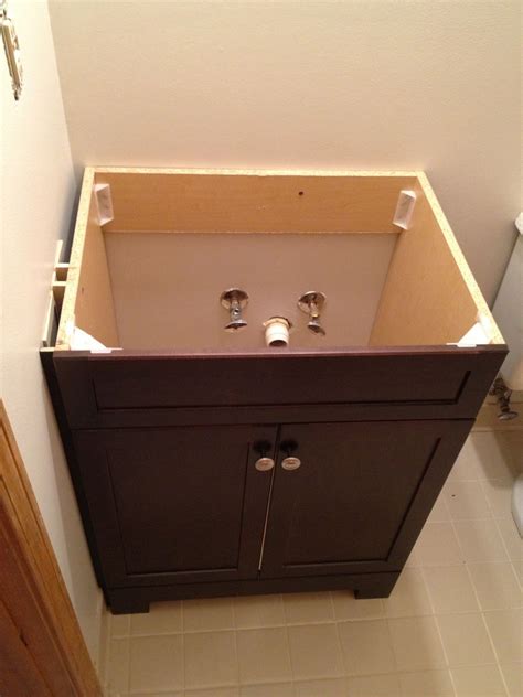 If you have extra fittings, like to a garbage disposal, then make sure to cut the power supply to it. How to Replace and Install a Bathroom Vanity