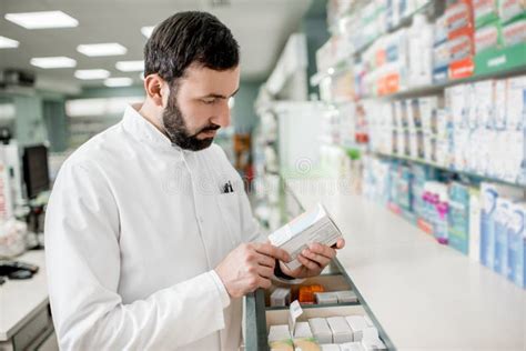 Pharmacist Working In The Pharmacy Store Stock Photo Image Of