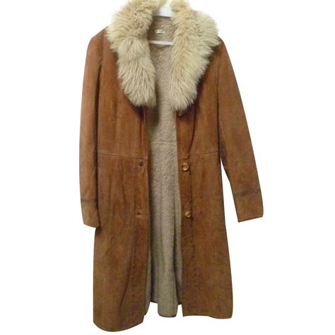 Très peu porté et toujours entretenu avec beaucoup de soin. Manteaux Autre Marque Long manteau en mouton Daim Caramel ...