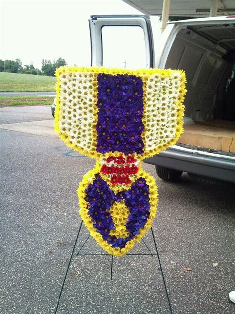 Such arrangements as casket sprays, floral rosaries, casket crosses, or lid arrangements are usually sent by the immediate family, and meant to be displayed on the casket in an intimate memorial. Weekly Florist Pictures | Flower Shop Network