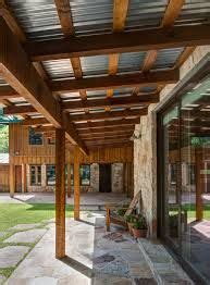 Gabled roofs can be covered with almost any type of material including asphalt shingles, cedar shakes, terra cotta, metal, and clay or concrete tiles. exposed metal roof overhang - Google Search | roof ...