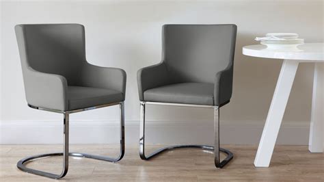 There's nothing like statement seating for a pop of colour, personality and comfort in the living room. Form Black Chrome Cantilever Dining Armchair | Dining arm ...
