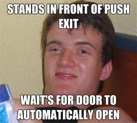 Stands In Front Of Push Exit Waits For Door To Automatically Open 10