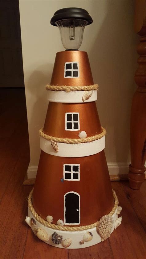 My New Lighthouse Diy Gardendecors In 2022 Lighthouse Crafts Clay