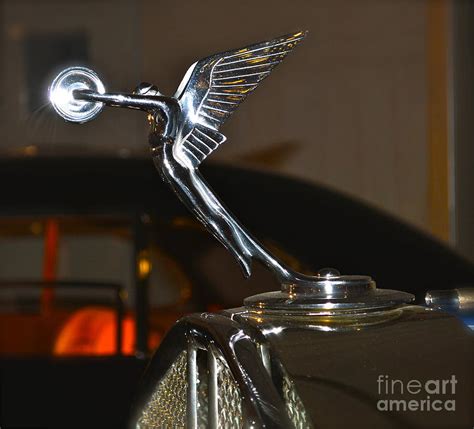 Maybe you would like to learn more about one of these? Rolls Royce Emblem Photograph by Pamela Walrath