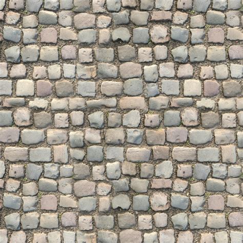 Premium Photo | Cobblestone pavement texture background. top view of