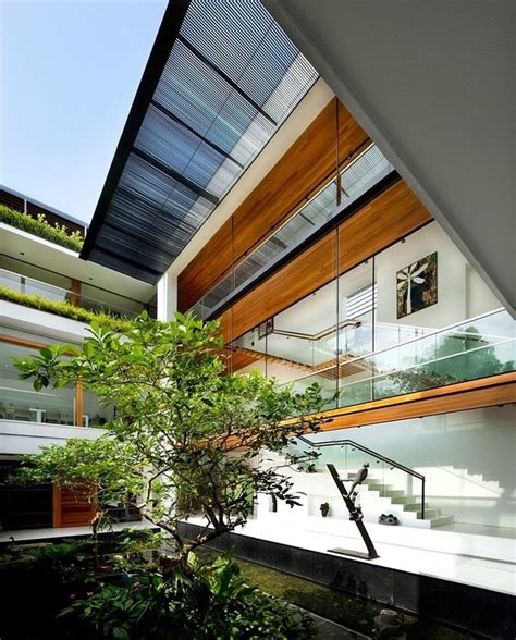 Rooftop Lawn House With Huge Glass Walls