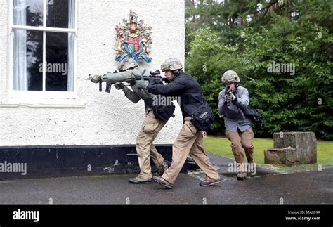 Members Of The Close Protection Unit Royal Military Police Clear A