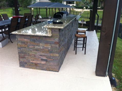 You can choose an outdoor kitchen island that incorporates a propane grill and an ice canister so you can avoid utilities. Just about done with my outdoor kitchen (DIY) (granite ...