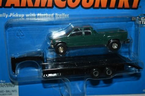 Ertl 164 Farm Country Gmc Dually Pickup With Flatbed Trailer
