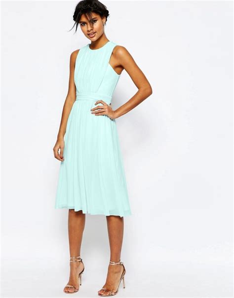 Thinking of straying from the normal white wedding dress? Wedding Guest Dresses for Spring Weddings