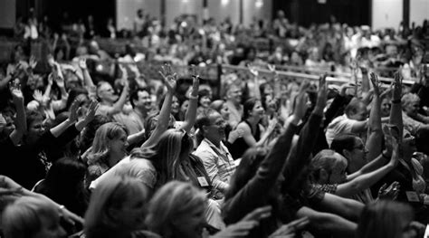 Black And White Crowd Raise The Bar