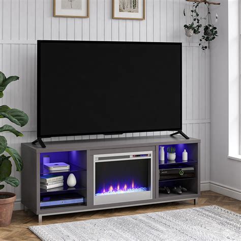 Stand combines sturdy metal parts with white laminated particleboard, hollow core and mdf with tempered glass to make a sleek and modern fireplace tv stand for your home. Ameriwood Lumina Fireplace TV Stand for TVs up to 70" Wide ...