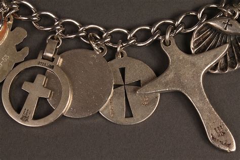 Check spelling or type a new query. Lot 371: James Avery sterling charm bracelet & gold cross ...