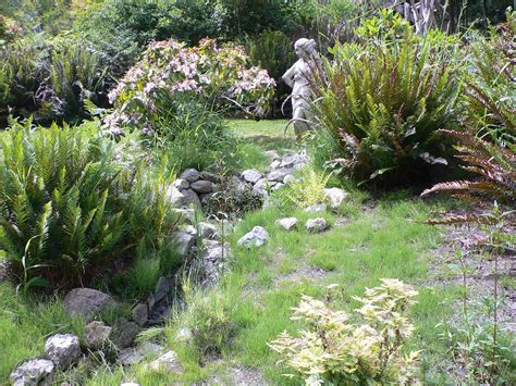 I pick up garden ornaments on Craigslist and find spots for them. Love