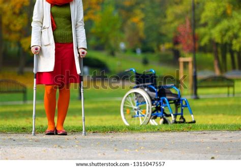 Woman Practicing Walking On Crutches Green Stock Photo 1315047557