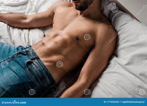 View Of Shirtless Sexy Man Lying Stock Photo Cartoondealer Com