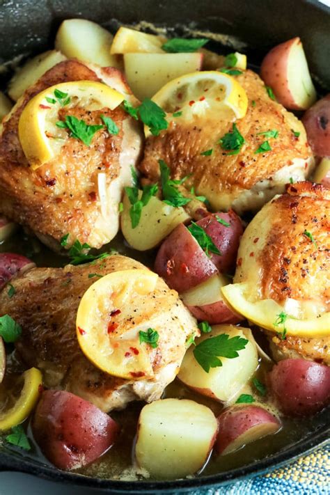 Easy Baked Lemon Chicken Thighs And Potatoes One Skillet Meal