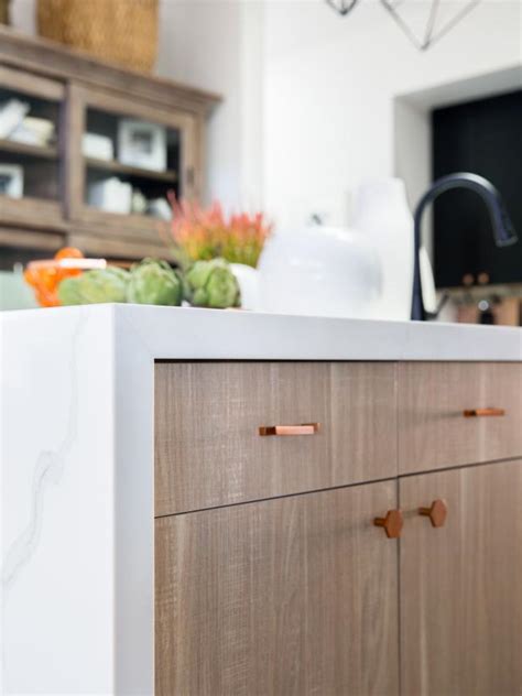 Coastal charm infuses every inch of this kitchen with a bold blue and white color palette that feels modern using navy blue cabinets on the lower section keeps the kitchen feeling grounded and adds a dash of color to the space that feels young and modern. Pictures of the HGTV Smart Home 2017 Kitchen | Full Room ...