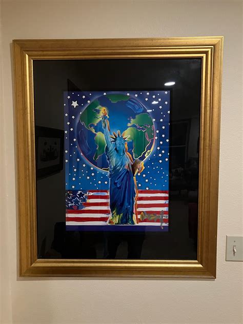I Have A Mixed Media Max Statue Of Liberty With The Flag Accross The