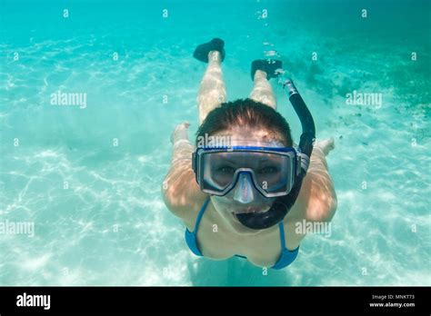 Woman Snorkeling In Tropical Lagoon Hi Res Stock Photography And Images