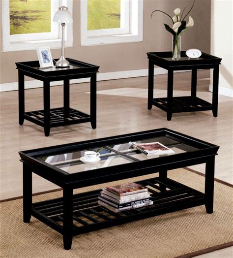 Having a transitional design and an espresso finish, this dark wood coffee table set and end table set provides a dash of style to your living room. Glass Coffee Table SetA rich dark wood finish and polished ...