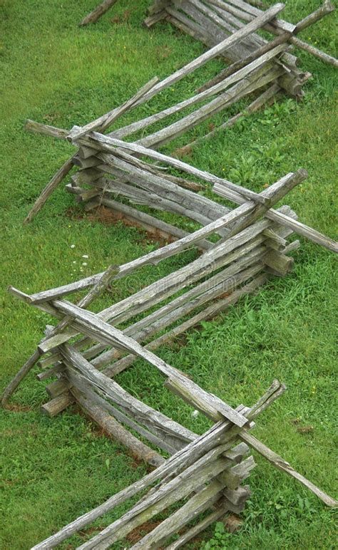 Rail fences are ideal if you want to border your garden or keep in any animals you have. Split rail fence stock photo in 2020 | Split rail fence ...