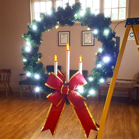 wreaths with candles will decorate hellertown light poles this christmas