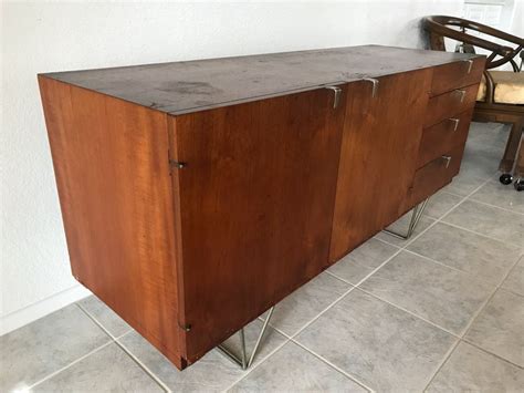 Check out the exquisite collection of. Mid-Century Modern Credenza Cabinet With Metal Legs By ...