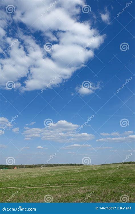 Green Field And Blue Sky With Clouds Beautiful Landscape Stock Image