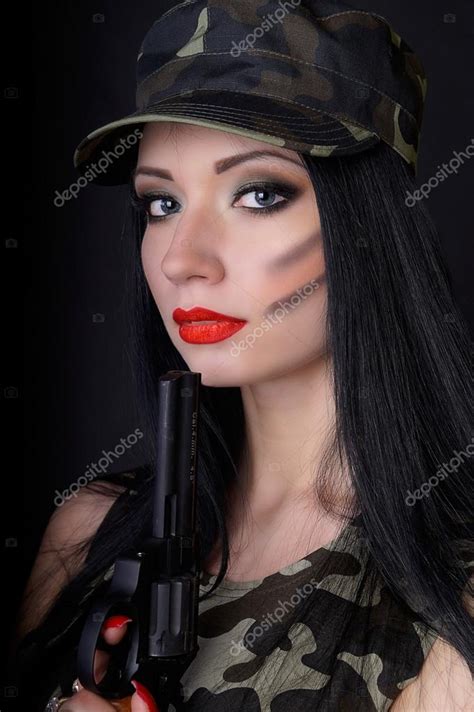Beautiful Girl With A Gun A Revolver Stock Photo By ©gopanchuk